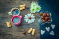 Sweets and cups with coffee on the wooden table